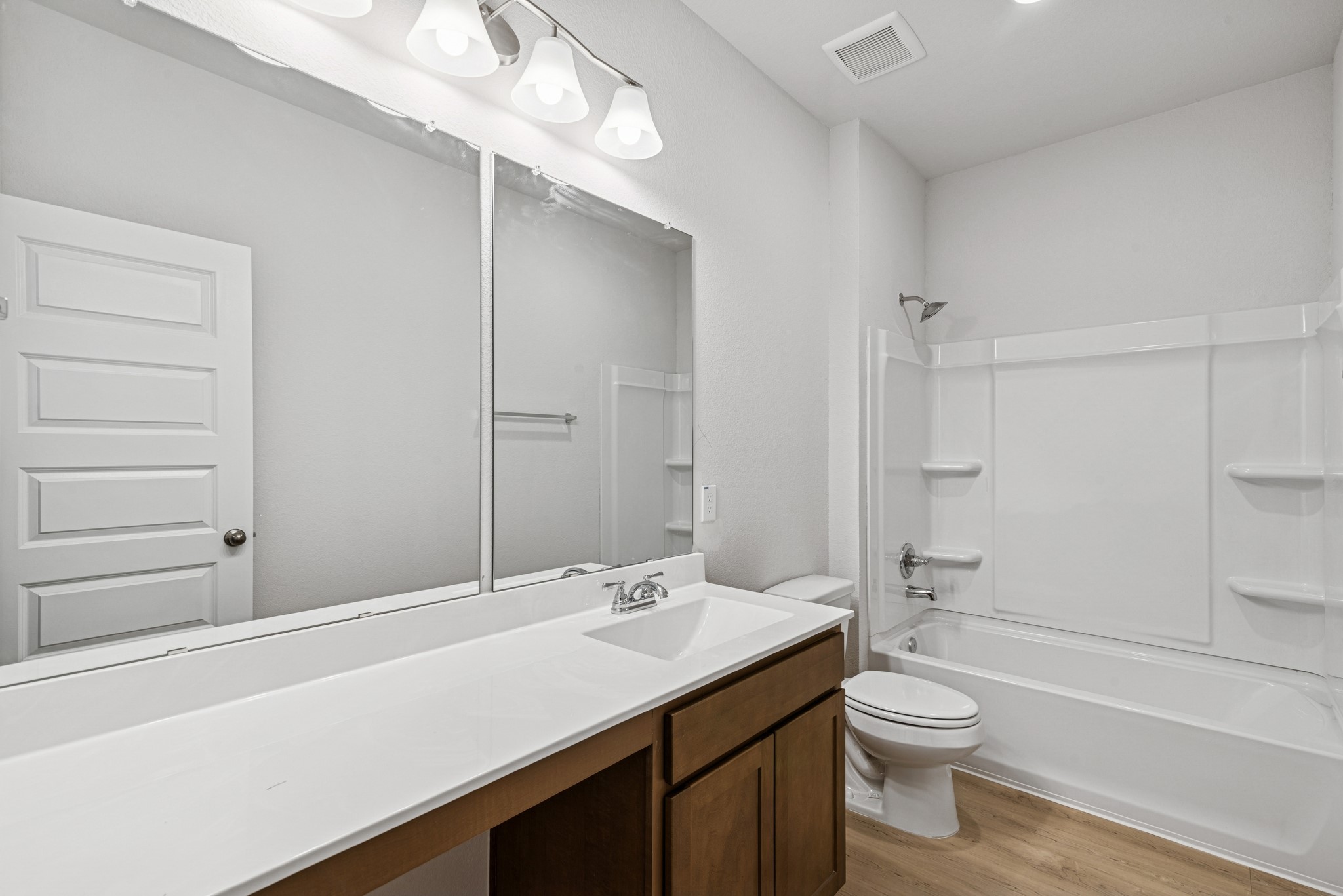 9745 Enclave Ridge Road Willis, TX 77318 - Photo 20 of 27 a bathroom with a sink a toilet and shower