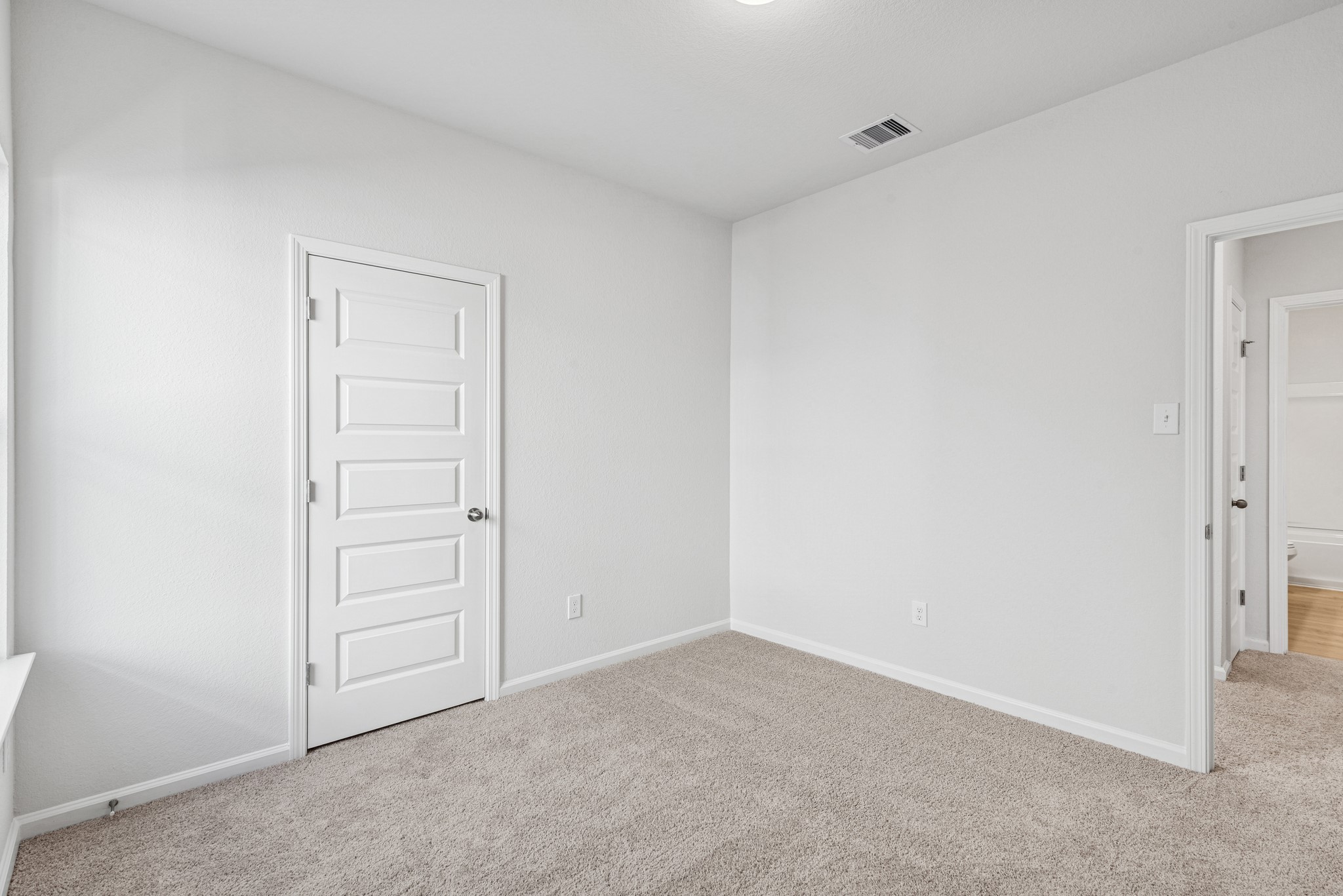 9745 Enclave Ridge Road Willis, TX 77318 - Photo 21 of 27 an empty room with closet area