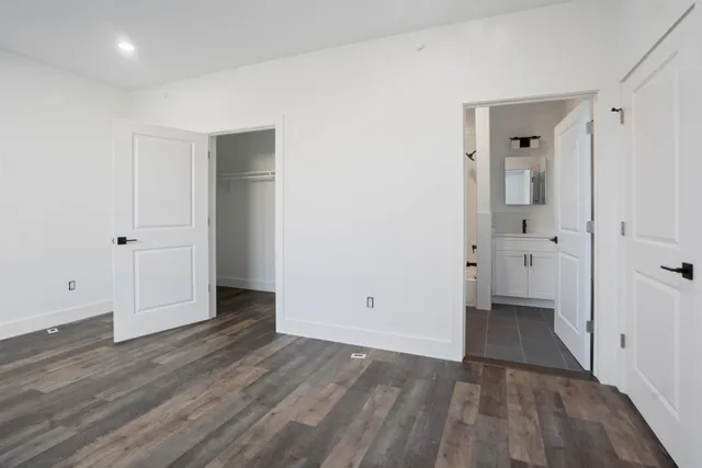 wooden floor and white doors
