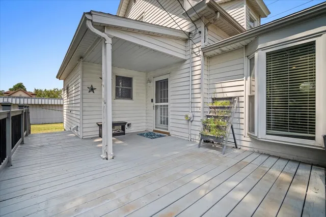 a view of outdoor seating area with wooden floor