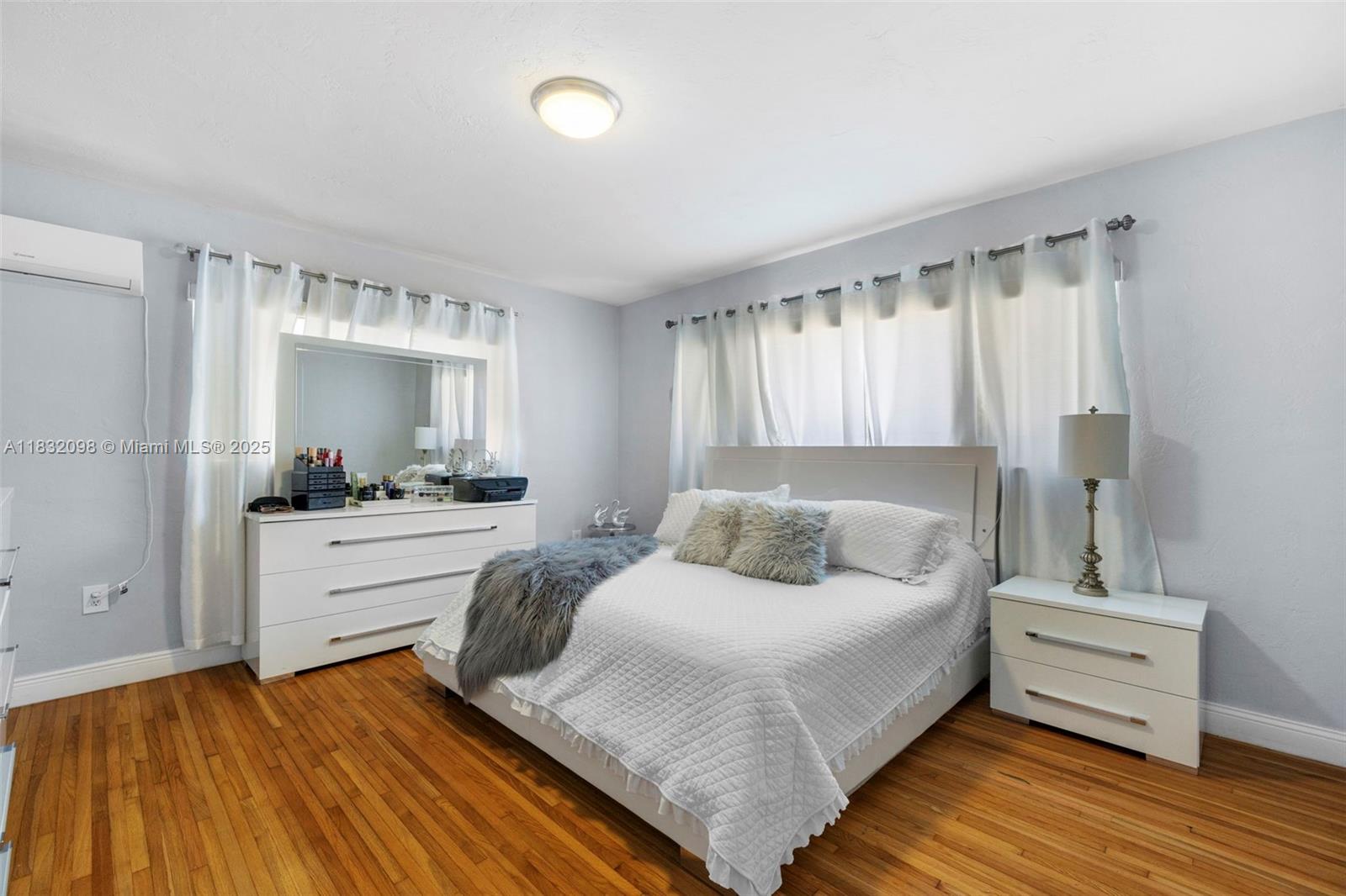 8631 Southwest 16th Terrace Miami, FL 33155 - Photo 21 of 61 a room with a bed and a mirror