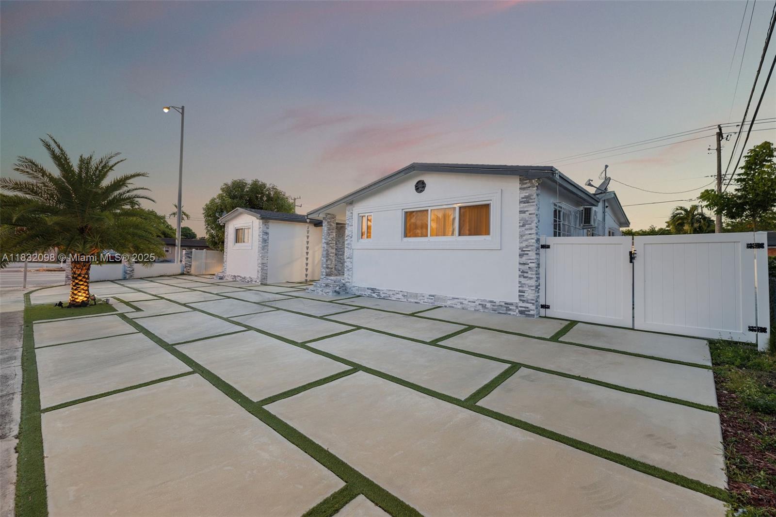 8631 Southwest 16th Terrace Miami, FL 33155 - Photo 52 of 61 a house view with a backyard space