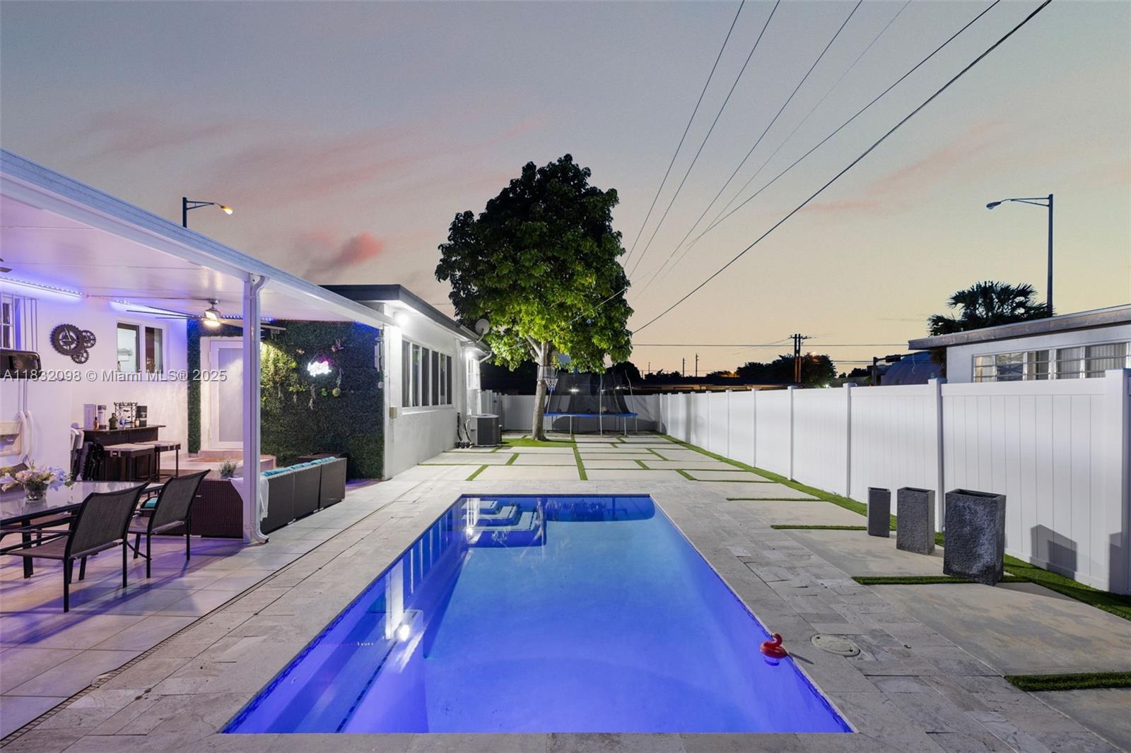 8631 Southwest 16th Terrace Miami, FL 33155 - Photo 54 of 61 a swimming pool with chairs