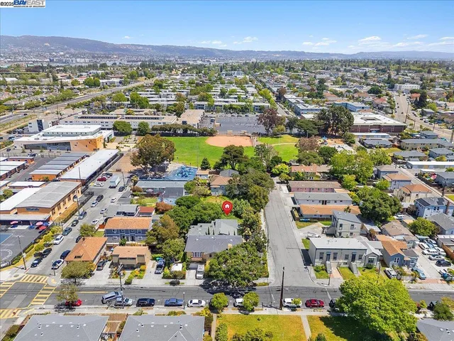an aerial view of a city with lots of residential buildings