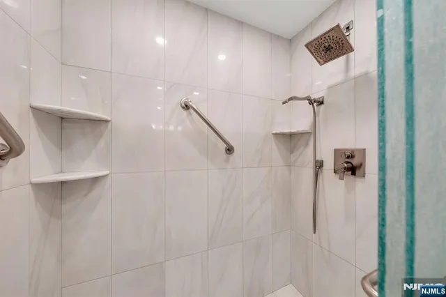 a room with gym equipment and a large window