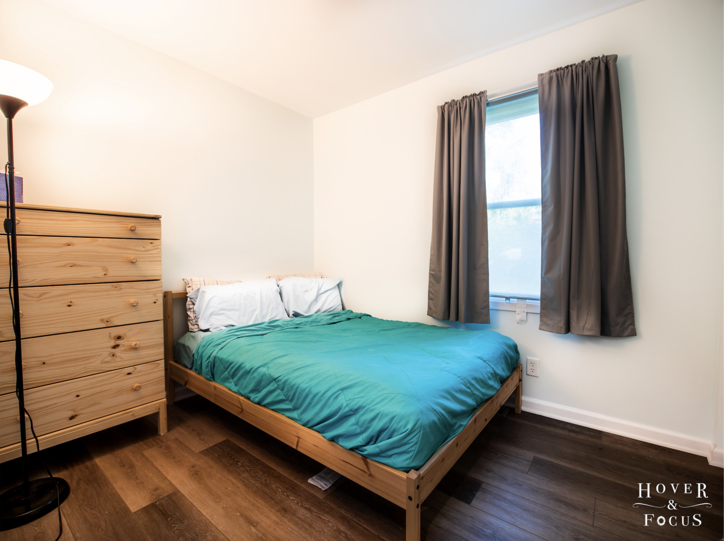 304 South Lily Lake Road McHenry, IL 60051 - Photo 11 of 12 a bed sitting in a bedroom next to a window