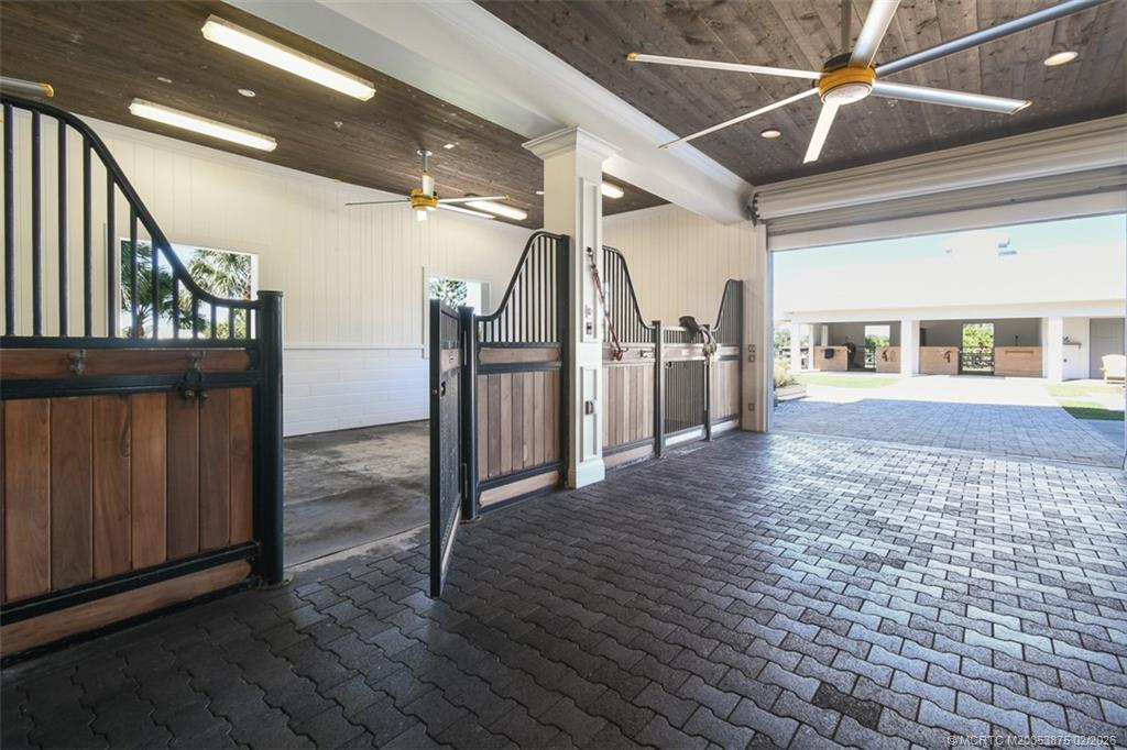 2541 Southwest Trailside Path Stuart, FL 34997 - Photo 52 of 100 a view of a hallway with wooden floor