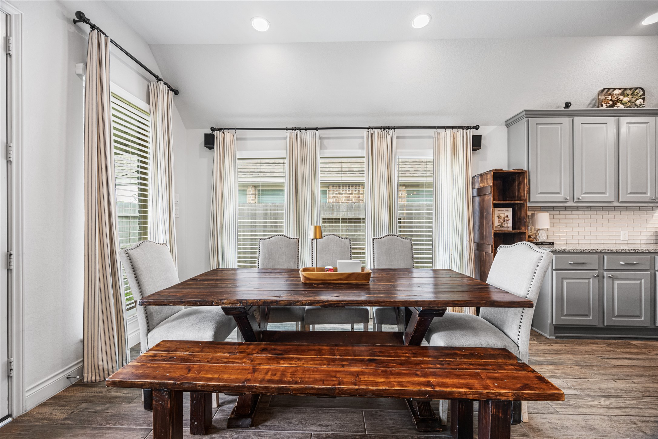 28169 Knight Peak Drive Spring, TX 77386 - Photo 12 of 33 a view of a dining room with furniture and wooden floor