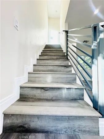 a view of a balcony with an outdoor space