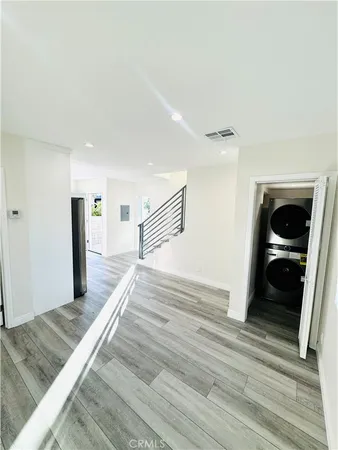 a bedroom with a bed and a walk in closet