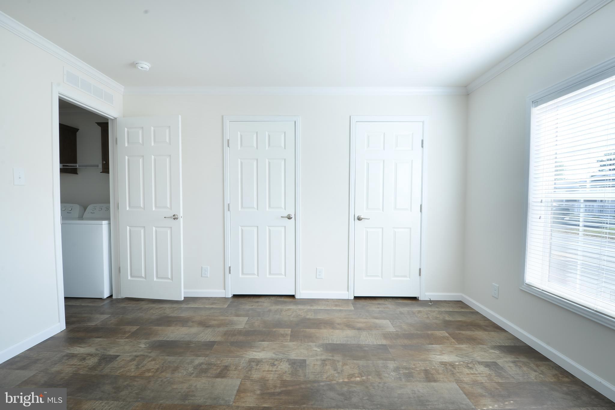8 Edgewater Drive, Unit 8 Magnolia, DE 19962 - Photo 11 of 13 an empty room with windows