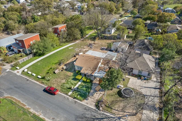an aerial view of a house with a garden