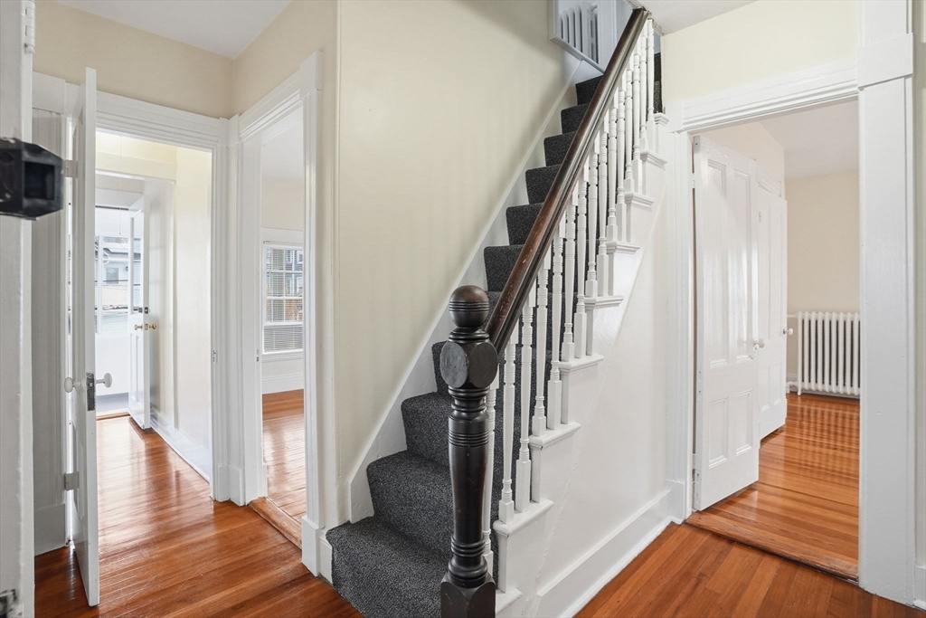 10 Charles Street, Unit 2 Winthrop, MA 02152 - Photo 14 of 22 a view of entryway and hall with wooden floor
