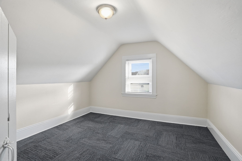 10 Charles Street, Unit 2 Winthrop, MA 02152 - Photo 17 of 22 an empty room with a empty space and windows