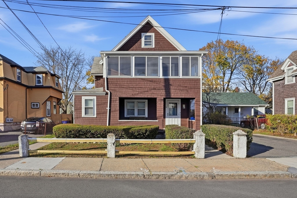 10 Charles Street, Unit 2 Winthrop, MA 02152 - Photo 22 of 22 a front view of a house with a yard
