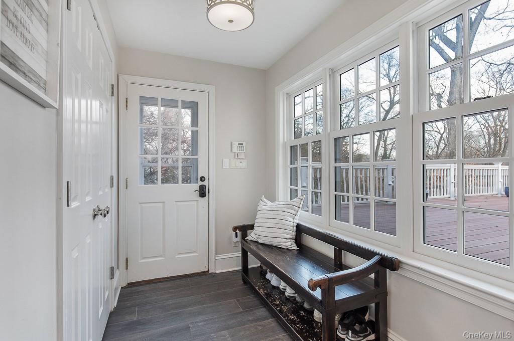 94 Round Hill Road Scarsdale, NY 10583 - Photo 20 of 46 One of the home's two mudrooms is conveniently located off the kitchen.