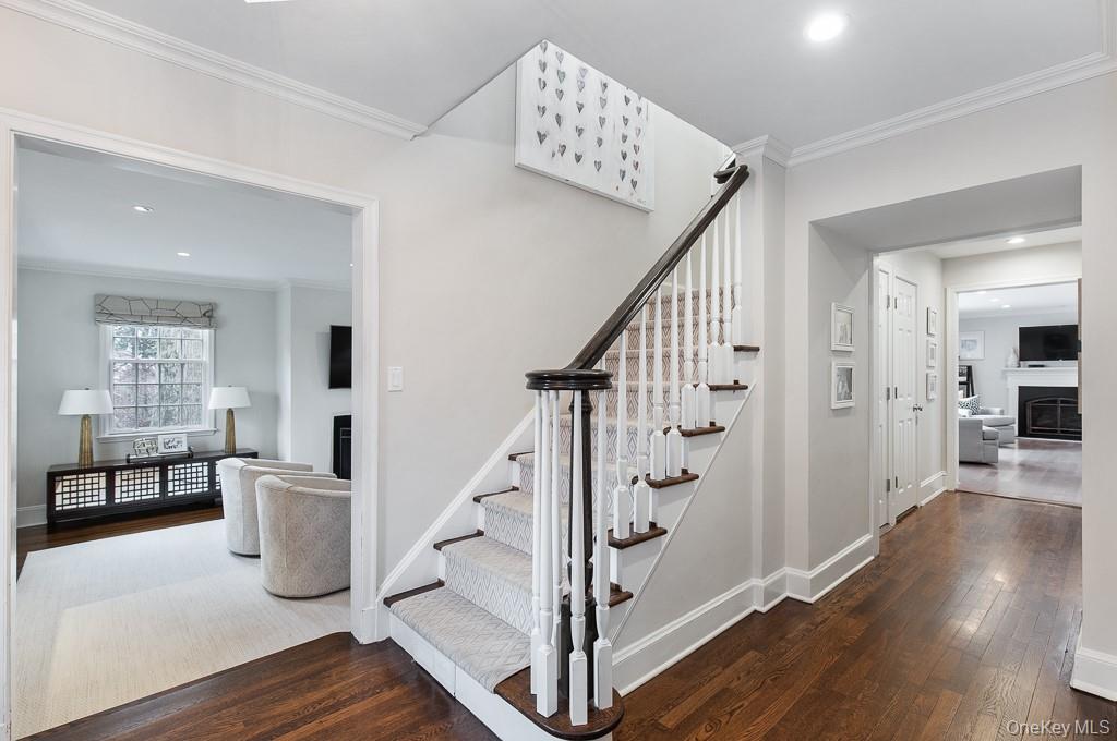 94 Round Hill Road Scarsdale, NY 10583 - Photo 3 of 46 View of the formal entrance hall with a classic center hall layout.