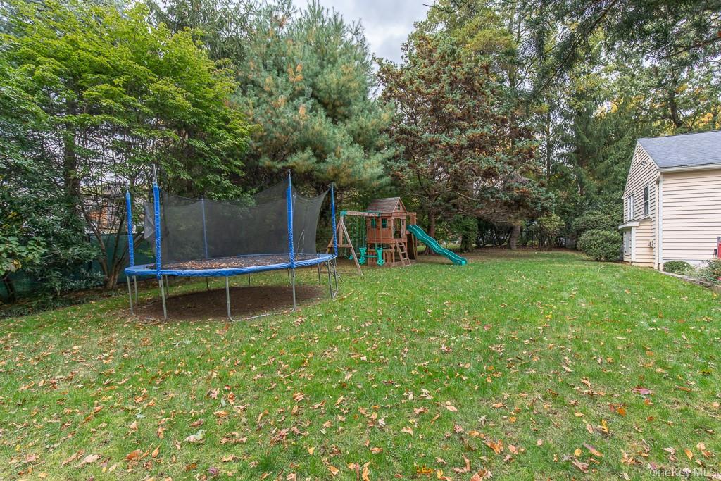 94 Round Hill Road Scarsdale, NY 10583 - Photo 36 of 46 Alternative view of the landscaped backyard with room for a pool.