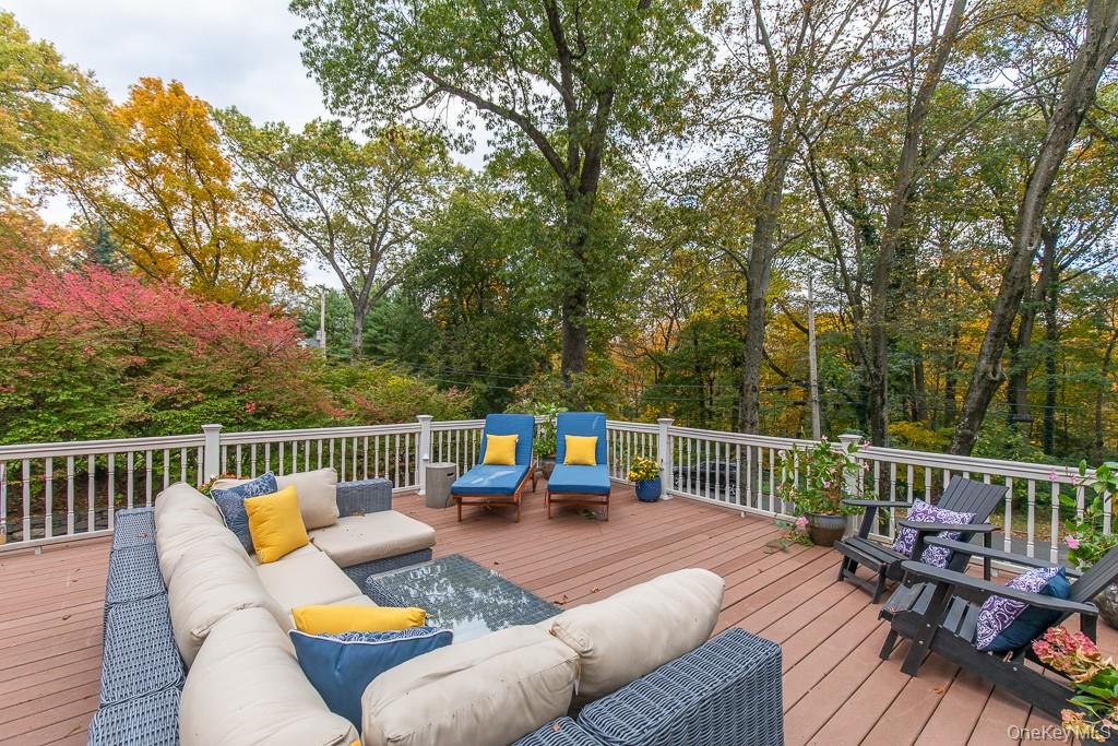 94 Round Hill Road Scarsdale, NY 10583 - Photo 40 of 46 Additional view of the expansive deck overlooking the magnificent property.