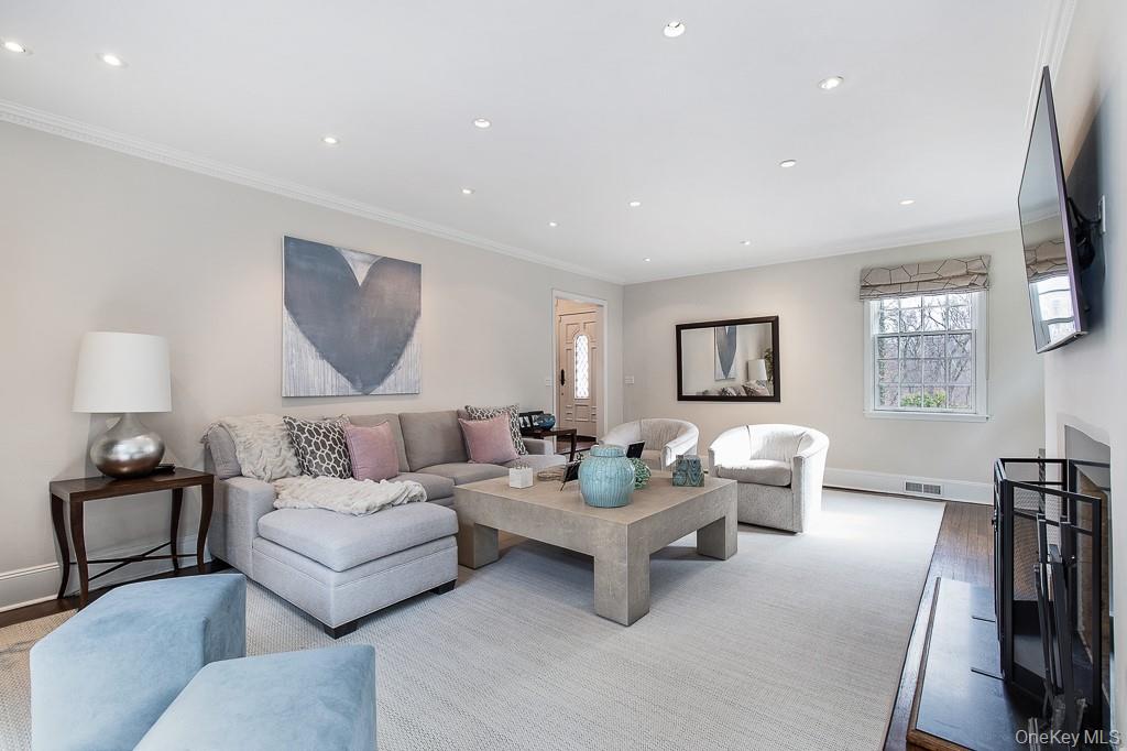 94 Round Hill Road Scarsdale, NY 10583 - Photo 6 of 46 Additional view of the formal living room showcases the gracious size and scale of the elegant space.