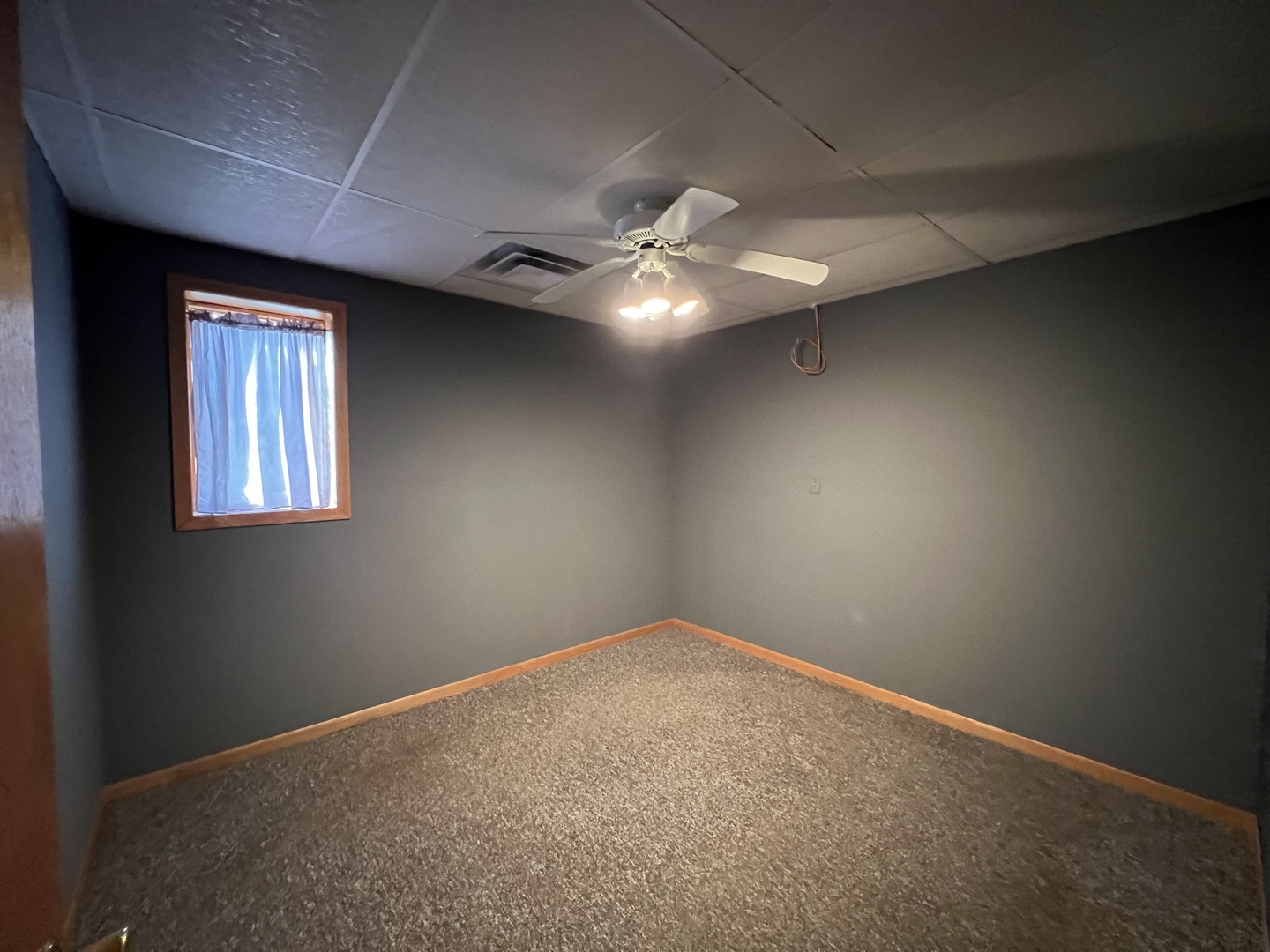 303 East State Road Mount Carroll, IL 61053 - Photo 16 of 26 an empty room with a window