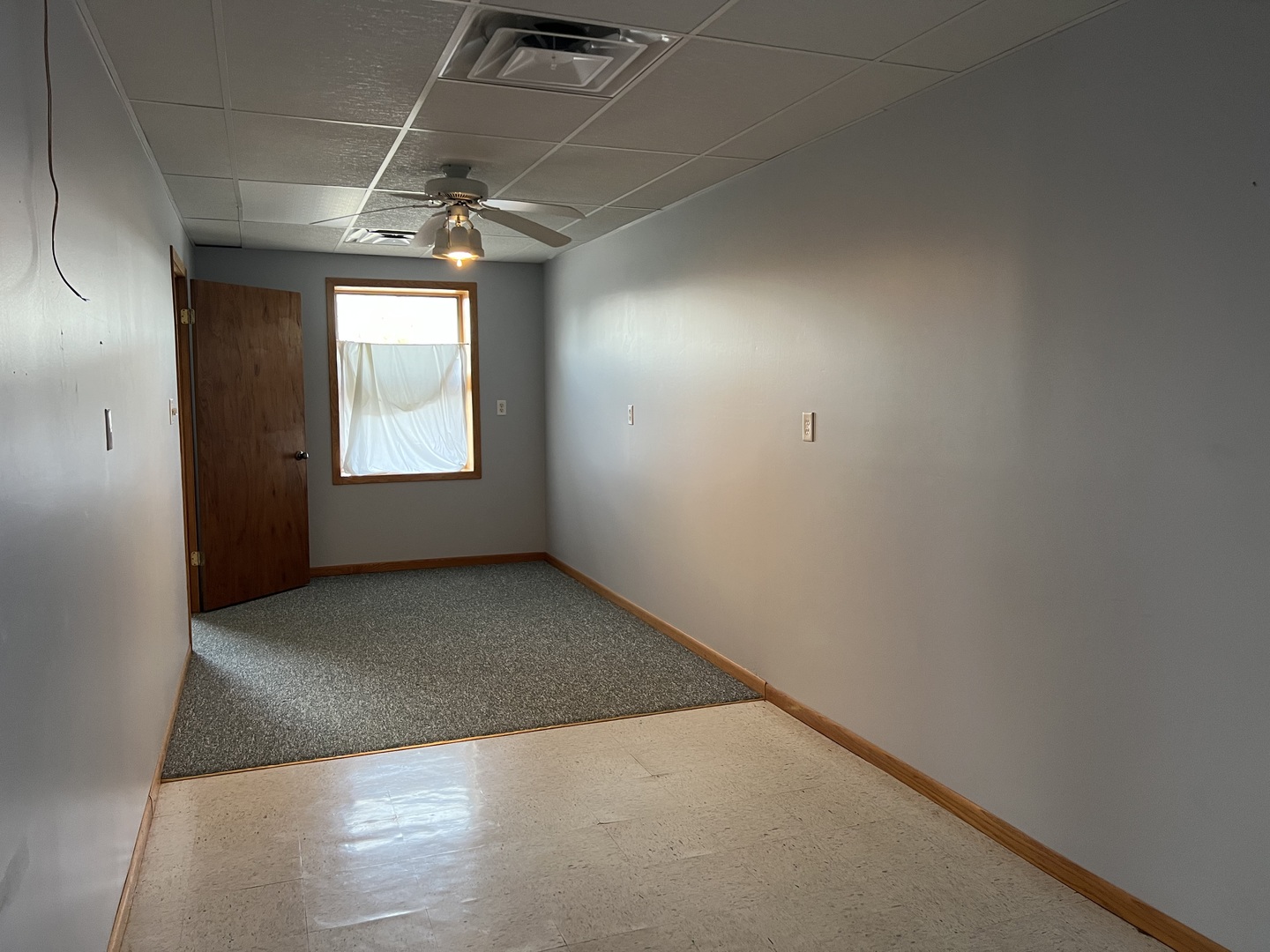 303 East State Road Mount Carroll, IL 61053 - Photo 10 of 26 an empty room with windows