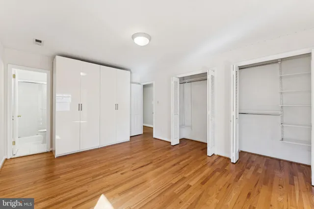 a view of a livingroom with wooden floor