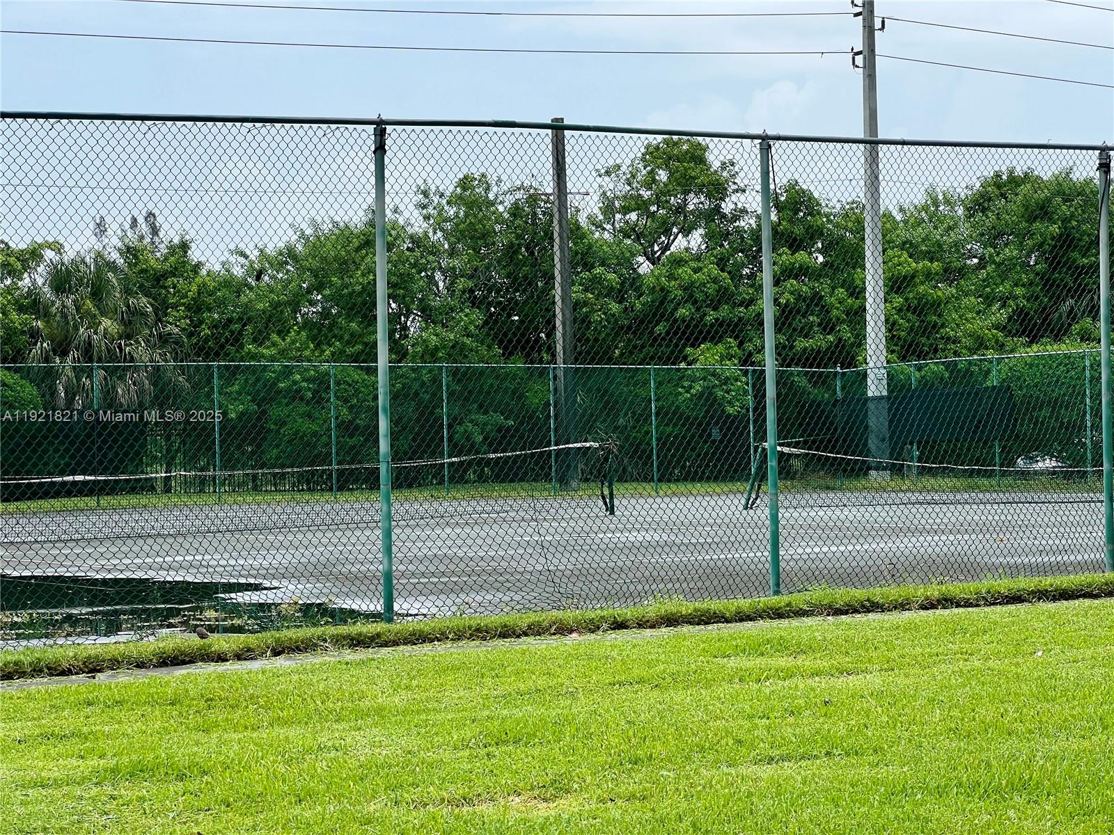 1477 Lake Crystal Drive, Unit F West Palm Beach, FL 33411 - Photo 16 of 16 a view of a park