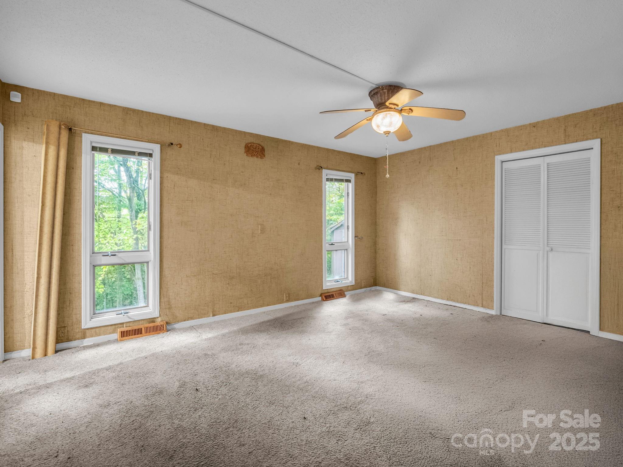 421 Chickadee Lane Brevard, NC 28712 - Photo 14 of 32 a view of an empty room with a window