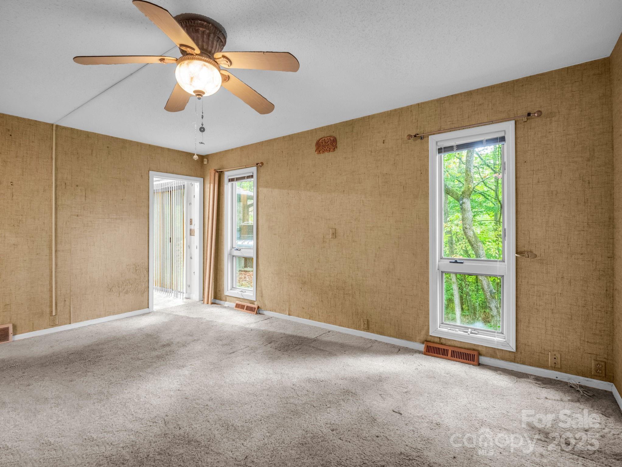 421 Chickadee Lane Brevard, NC 28712 - Photo 15 of 32 a view of an empty room with a window