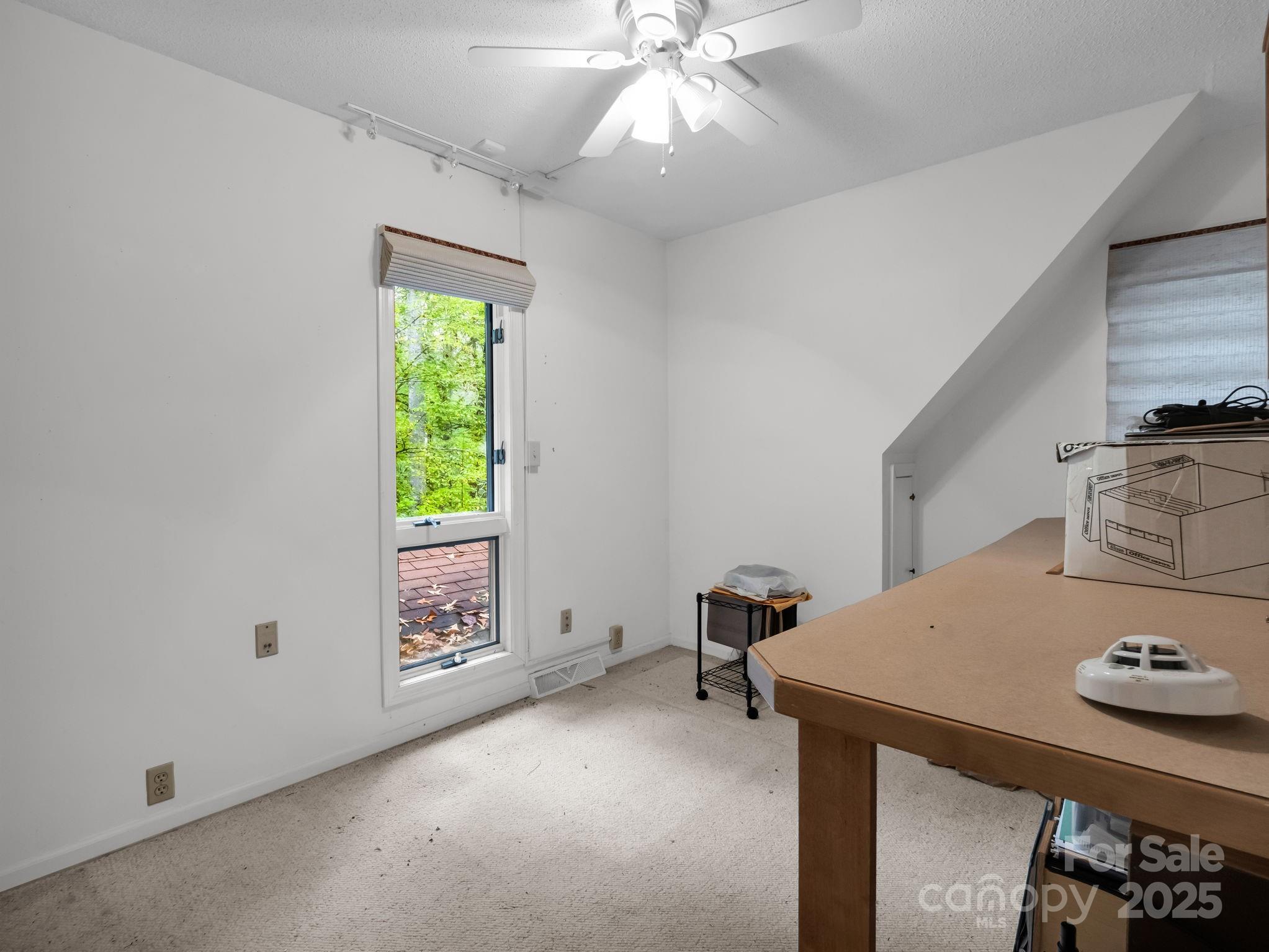 421 Chickadee Lane Brevard, NC 28712 - Photo 20 of 32 a view of workspace with furniture and window