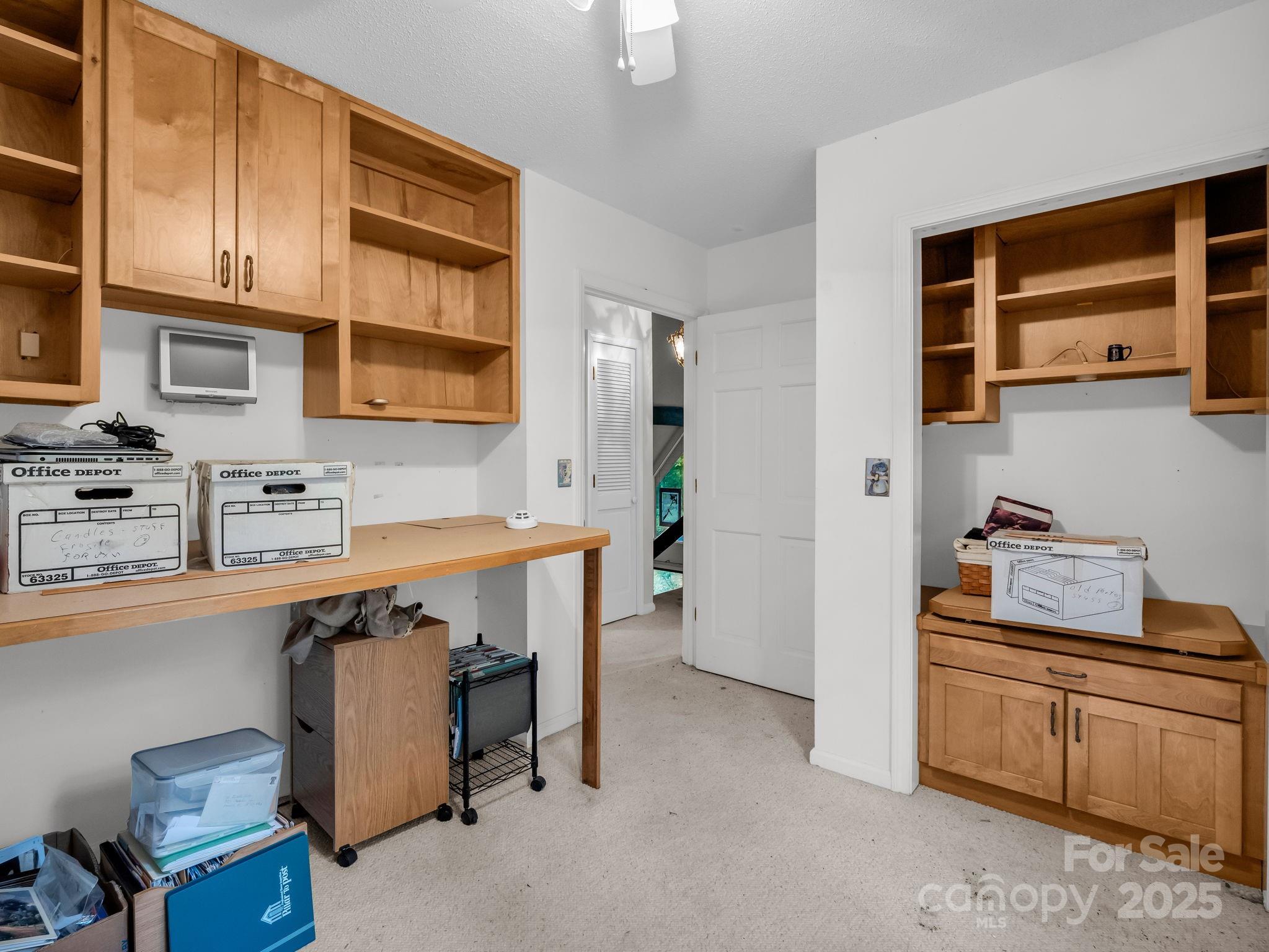 421 Chickadee Lane Brevard, NC 28712 - Photo 21 of 32 a view of kitchen with stainless steel appliances granite countertop a stove and a sink