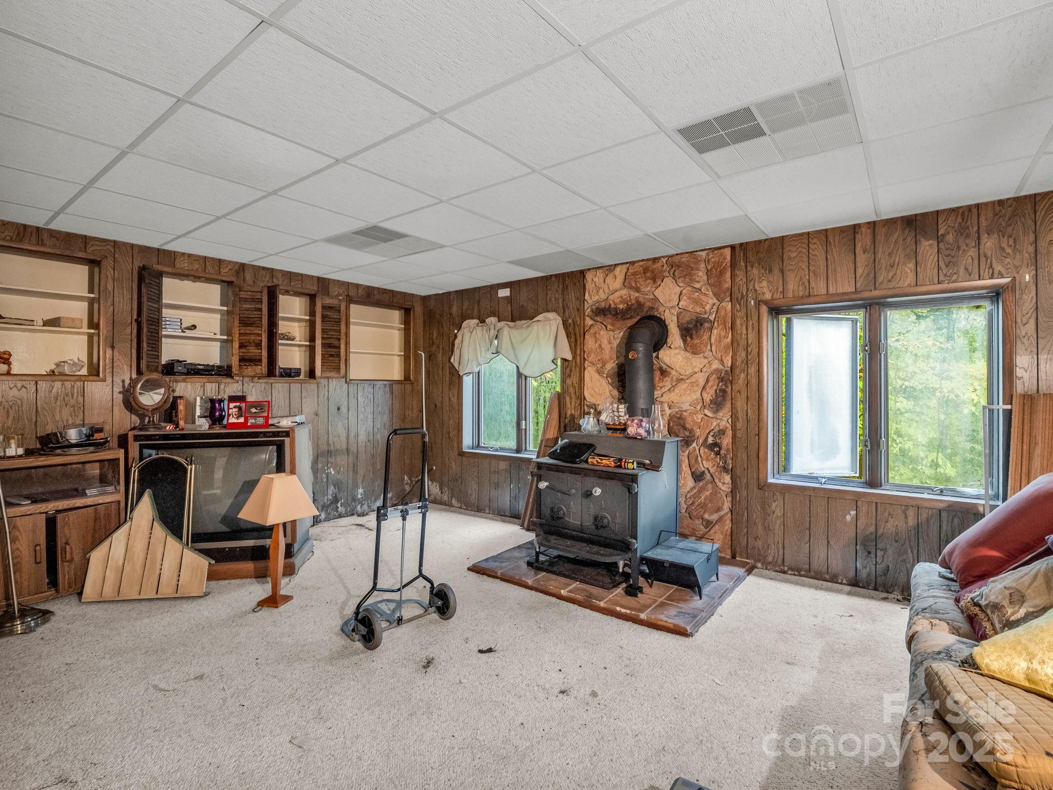 421 Chickadee Lane Brevard, NC 28712 - Photo 26 of 32 a room with gym equipment and a large window
