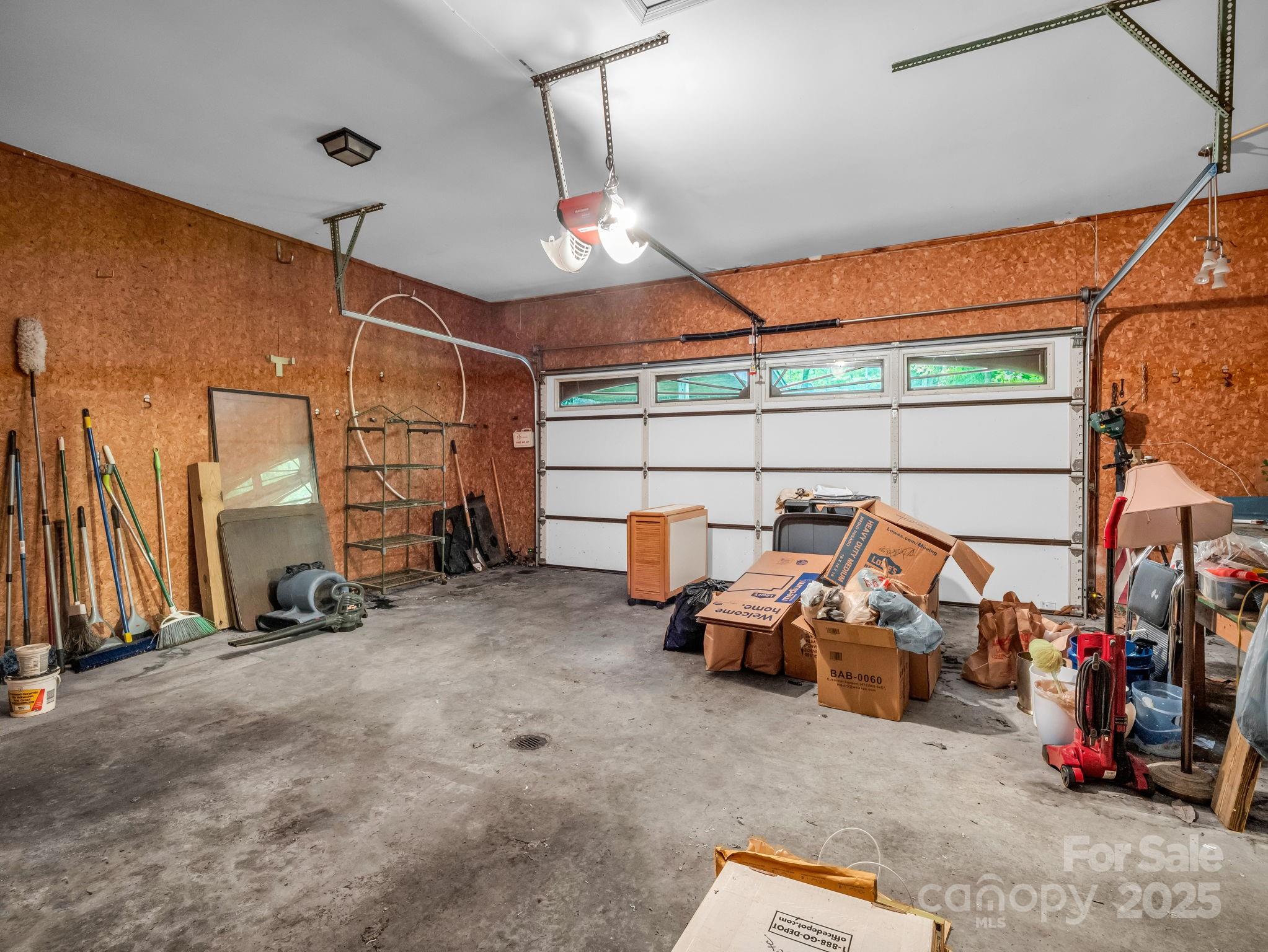 421 Chickadee Lane Brevard, NC 28712 - Photo 27 of 32 a view of a garage with cars