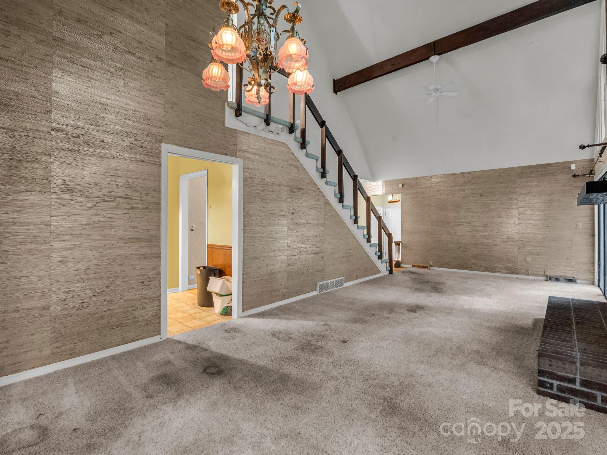 421 Chickadee Lane Brevard, NC 28712 - Photo 6 of 32 a view of a livingroom with stairs