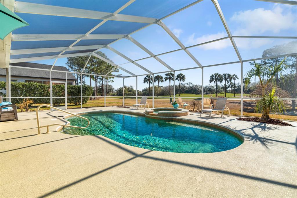 3408 Stonebridge Trail Valrico, FL 33596 - Photo 12 of 53 a view of a swimming pool with a patio