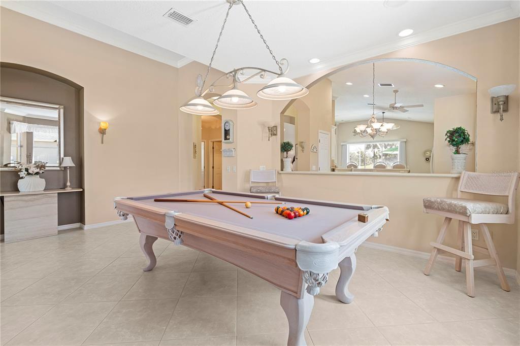 3408 Stonebridge Trail Valrico, FL 33596 - Photo 35 of 53 a room with table and white furniture