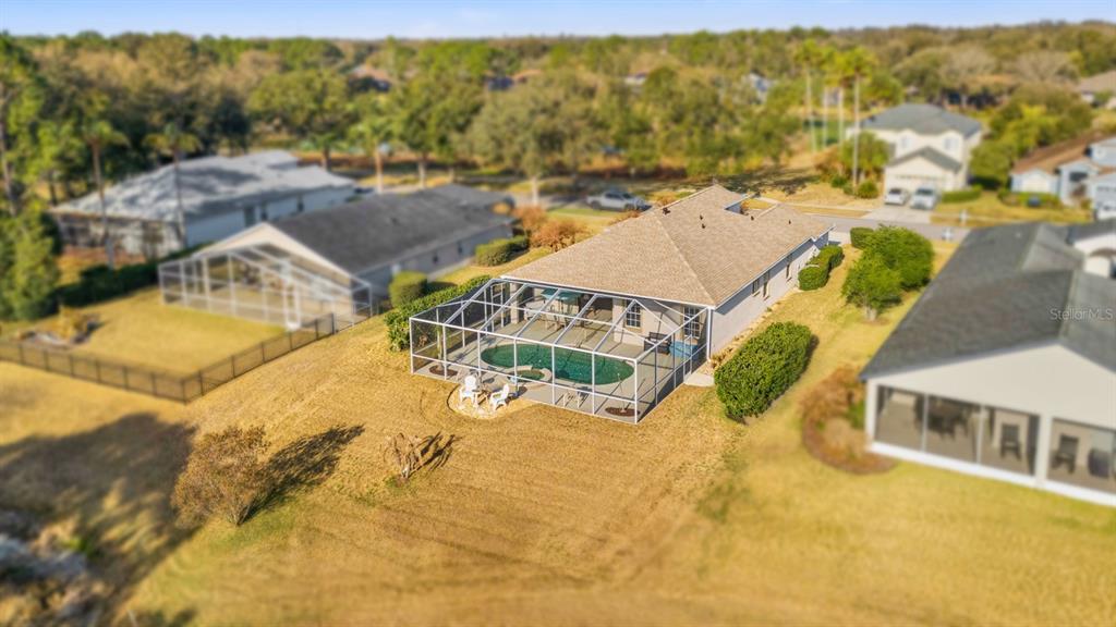 3408 Stonebridge Trail Valrico, FL 33596 - Photo 4 of 53 a view of a swimming pool with a yard