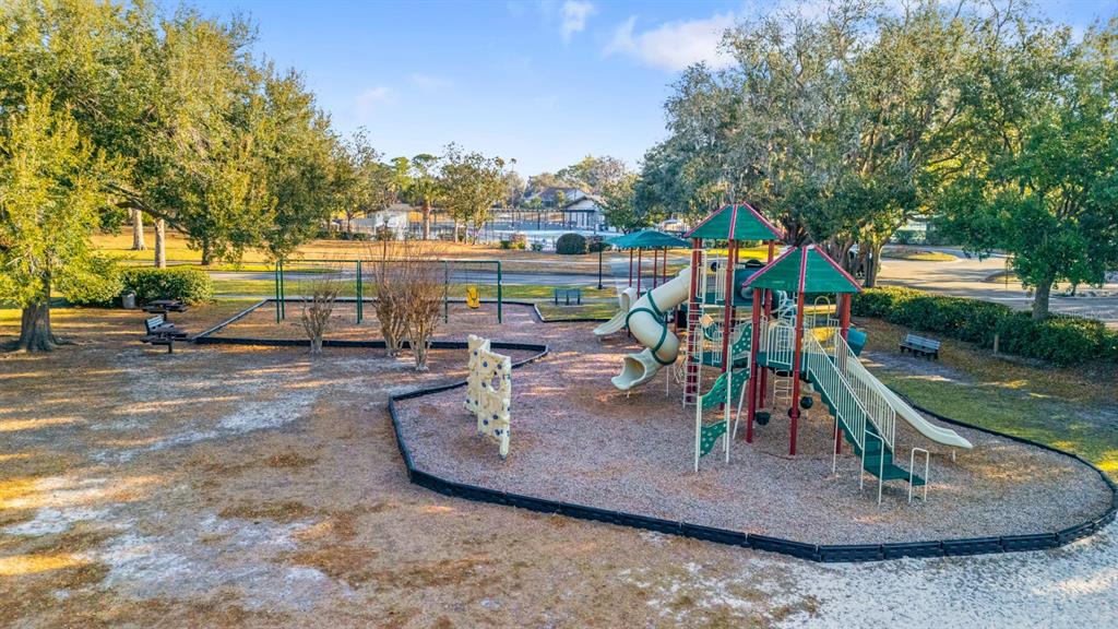 3408 Stonebridge Trail Valrico, FL 33596 - Photo 51 of 53 a view of a park with swings