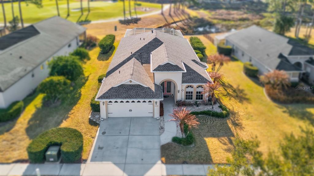3408 Stonebridge Trail Valrico, FL 33596 - Photo 9 of 53 a aerial view of a house with swimming pool