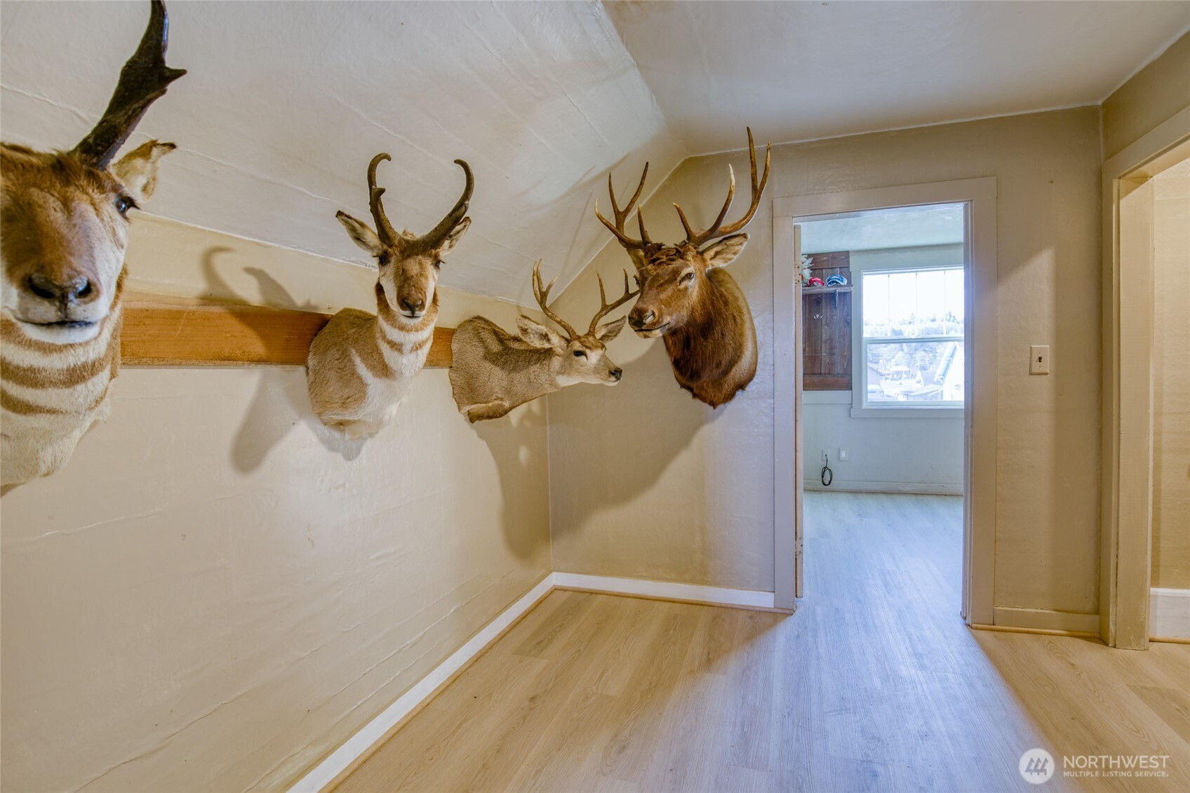 823 West 3rd Street Aberdeen, WA 98520 - Photo 23 of 40 a view of a room with wooden floor