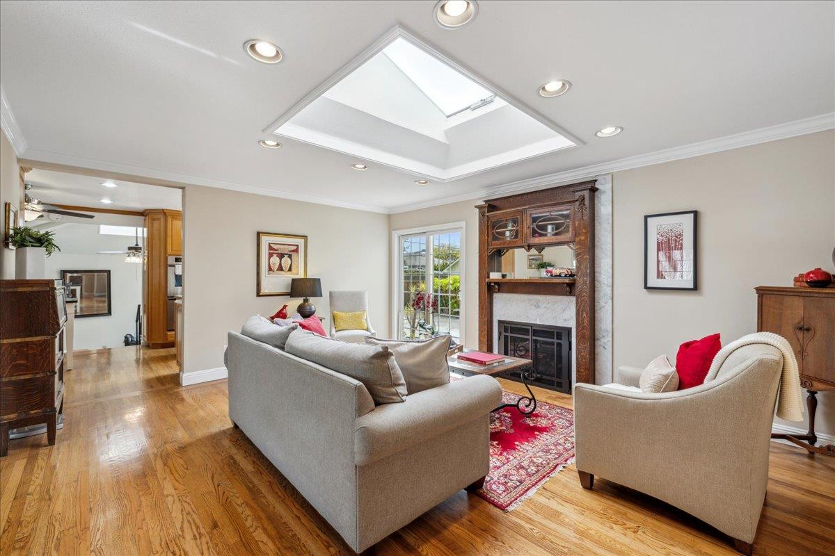 3726 Pasadena Drive San Mateo, CA 94403 - Photo 14 of 50 a living room with furniture and a fireplace