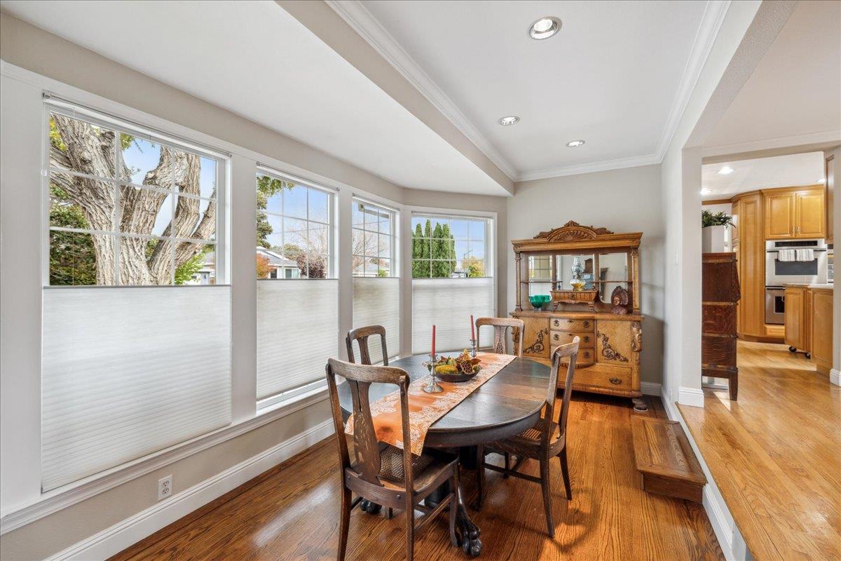 3726 Pasadena Drive San Mateo, CA 94403 - Photo 17 of 50 a view of a dining room with furniture window and wooden floor