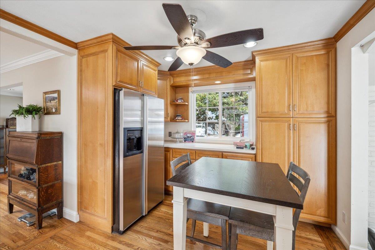 3726 Pasadena Drive San Mateo, CA 94403 - Photo 22 of 50 a dining table chair next to a window