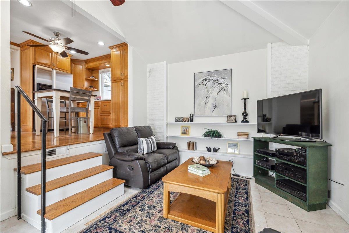 3726 Pasadena Drive San Mateo, CA 94403 - Photo 25 of 50 a living room with furniture and a flat screen tv