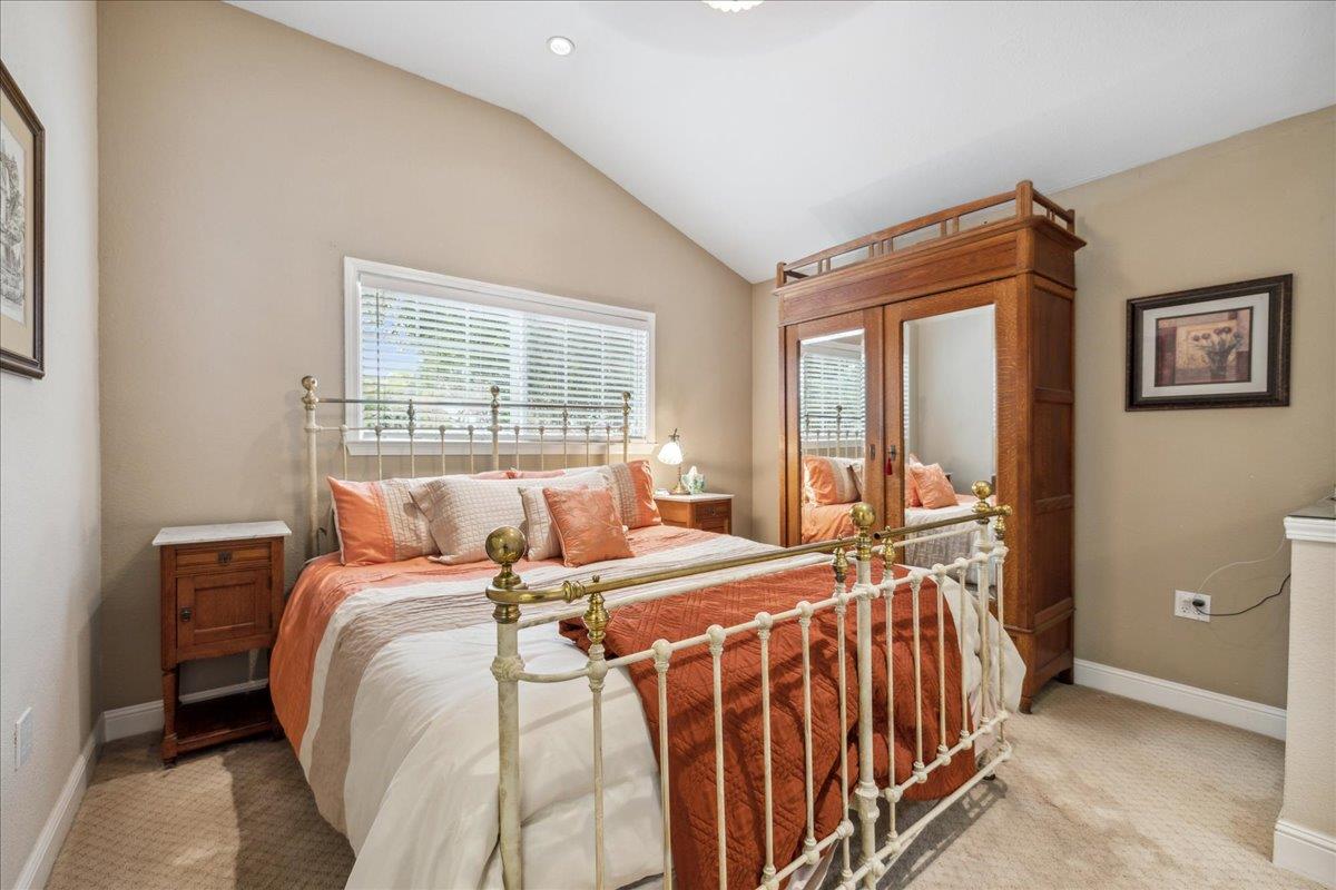 3726 Pasadena Drive San Mateo, CA 94403 - Photo 32 of 50 a bed sitting in a bedroom next to a window