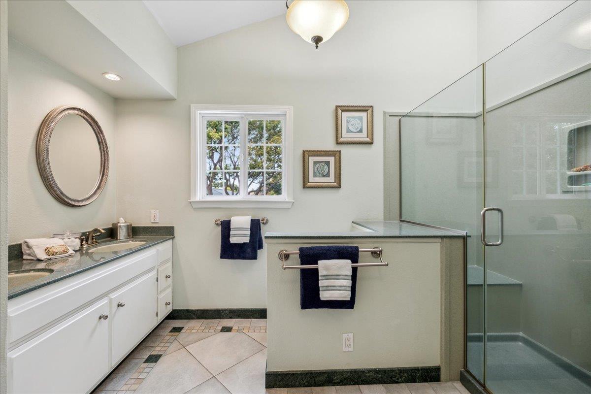 3726 Pasadena Drive San Mateo, CA 94403 - Photo 34 of 50 a bathroom with a sink and a mirror