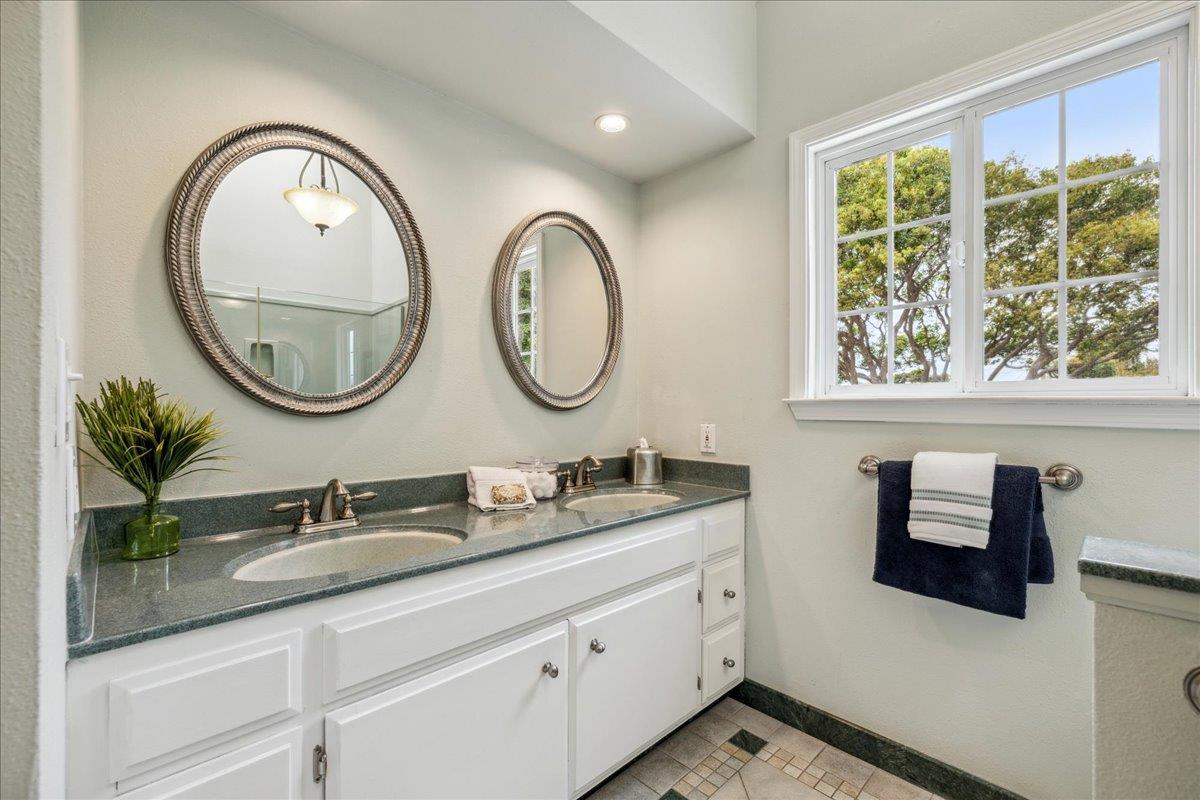 3726 Pasadena Drive San Mateo, CA 94403 - Photo 35 of 50 a bathroom with 2 sink and a mirror