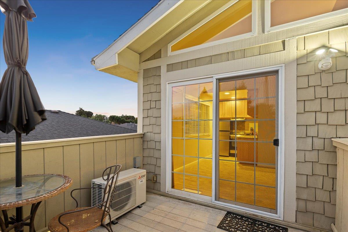 3726 Pasadena Drive San Mateo, CA 94403 - Photo 48 of 50 a view of a balcony with furniture and floor to ceiling window