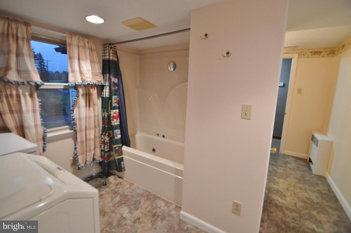 9 Hossler Road Manheim, PA 17545 - Photo 12 of 19 a bathroom with a tub sink and toilet